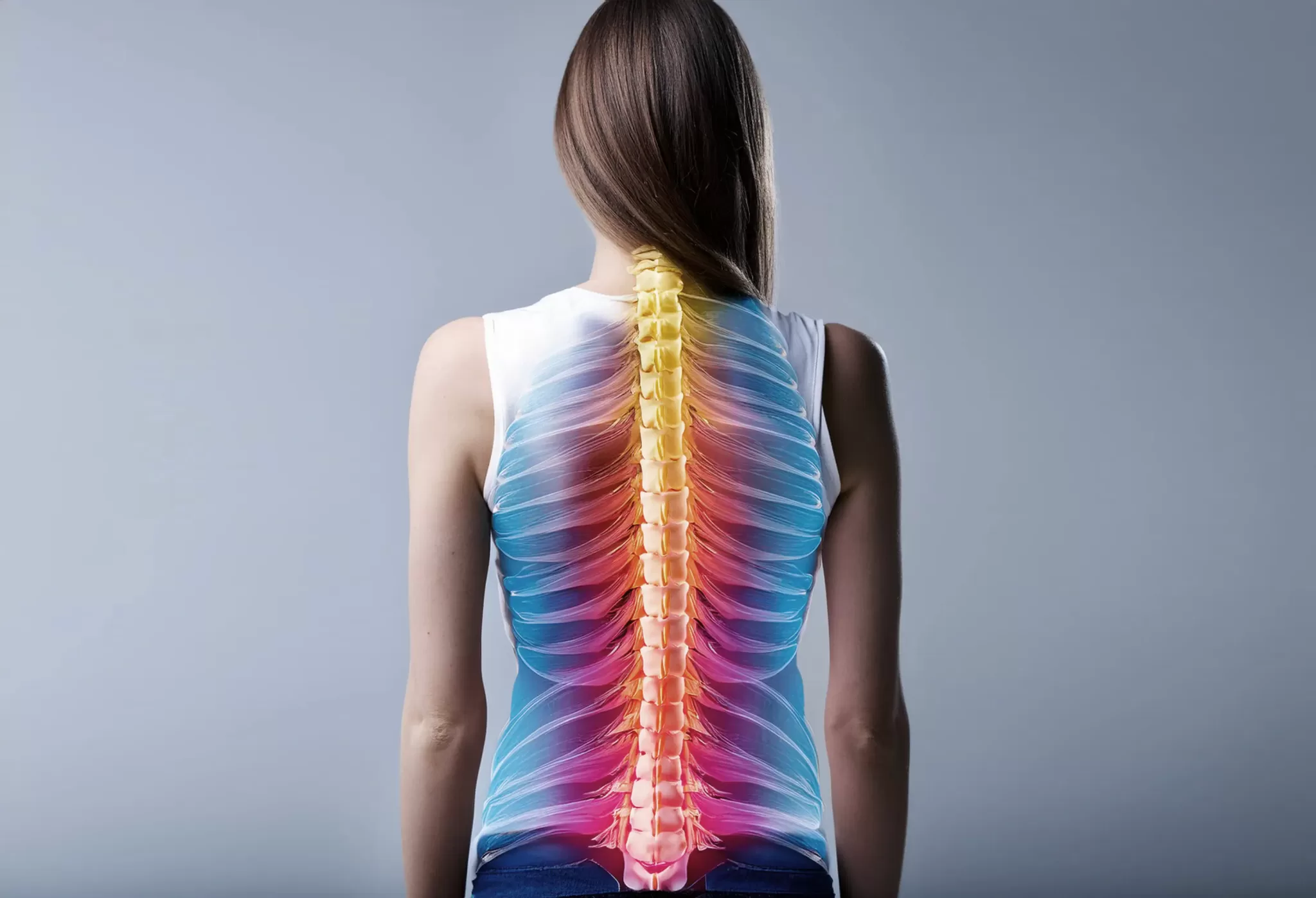 a woman's spine glows through her body